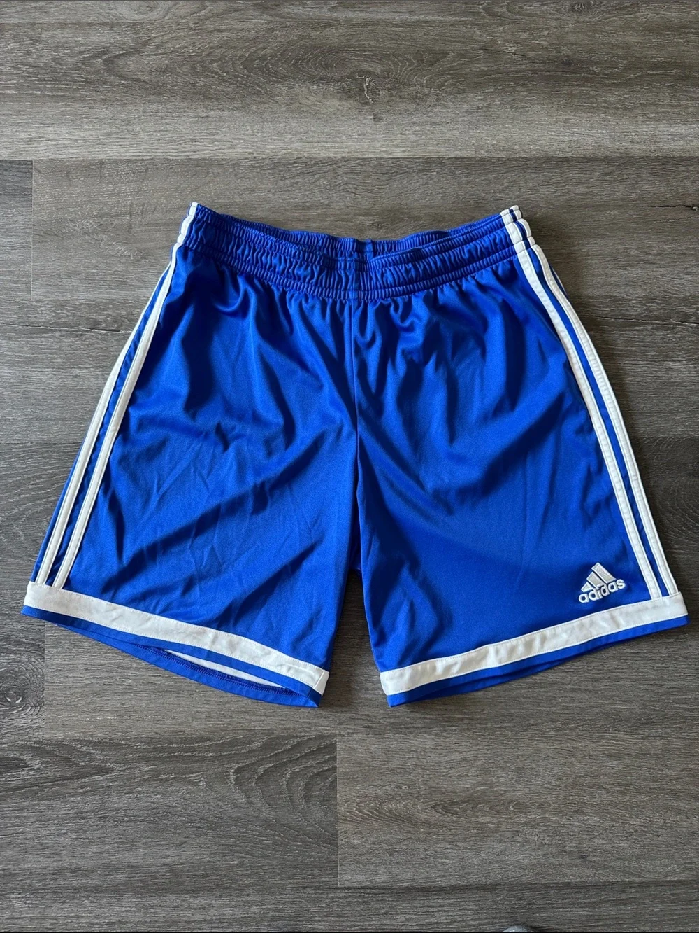 adidas boys Blue Athletic Shorts with White Stripes